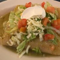 25. Enchiladas Verdes Supremas · 3 beef, chicken or cheese enchiladas in our green tomato sauce topped with lettuce, tomato a...