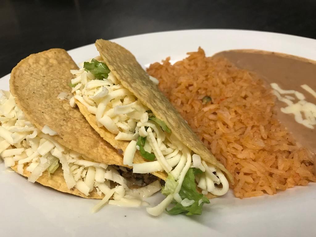 10. Two Beef Tacos Combo · Served with rice and beans.