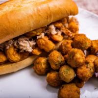 Skrimp and Crabmeat Po'Boy · 13 skrimps covered with blue crabmeat served on a toasted hoagie roll with your choice of ou...