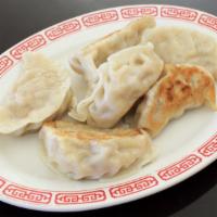Pot Stickers  · 6 homemade wheat wrappers filled with your choice of filling, pan-fried.
