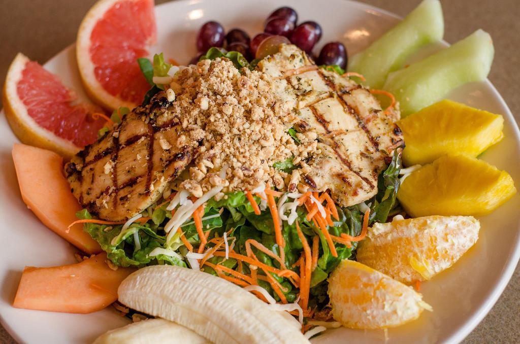 Market Chicken Salad · House greens, grilled chicken breast, carrots, fresh fruit, roasted Oregon hazelnuts, Jack cheese and blueberry vinaigrette. Served with grilled focaccia bread. (Packaged dressing served on the side)