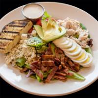 Classic Cobb Salad Lunch · House greens, turkey, bacon, hard-boiled egg, tomatoes, avocado, blue cheese crumbles and wh...