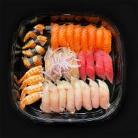 Sushi Party Tray A · For 2-4 Persons 
- 4 pcs Tuna
- 8 pcs Salmon
- 8 pcs. Yellowtail
- 4 pcs Albacore
- 4 pcs. S...