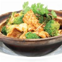 Thai Casserole · Thai red curry, lemongrass, coconut and Thai basil chicken and shrimp. Served with your choi...