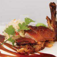 Crispy Duck with Fried Rice · Served with your choice of brown or white rice.