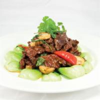 Sliced Flank Steak with Thai Basil · Lemongrass and soy ginger. Served with your choice of brown or white rice.