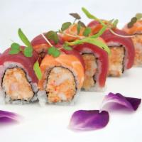 Mars Roll · Crunchy spicy lobster with cucumber inside. Topped with salmon and tuna.