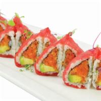 Passion Roll · Crunchy spicy tuna, avocado, inside top with thinyly sliced tuna with spicy cream sauce.