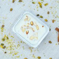 Almond Pudding (Keşkül) · Our homemade almond pudding topped with almonds. (Includes nuts)
