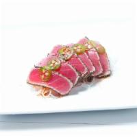 Tuna Tataki · Thin slices of peppered seared tuna with garlic ponzu sauce