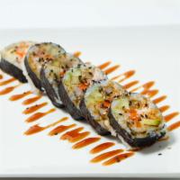 Shrimp Tempura Roll · Shrimp tempura, crab meat, avocado, cucumber, and carrot inside with eel sauce on top