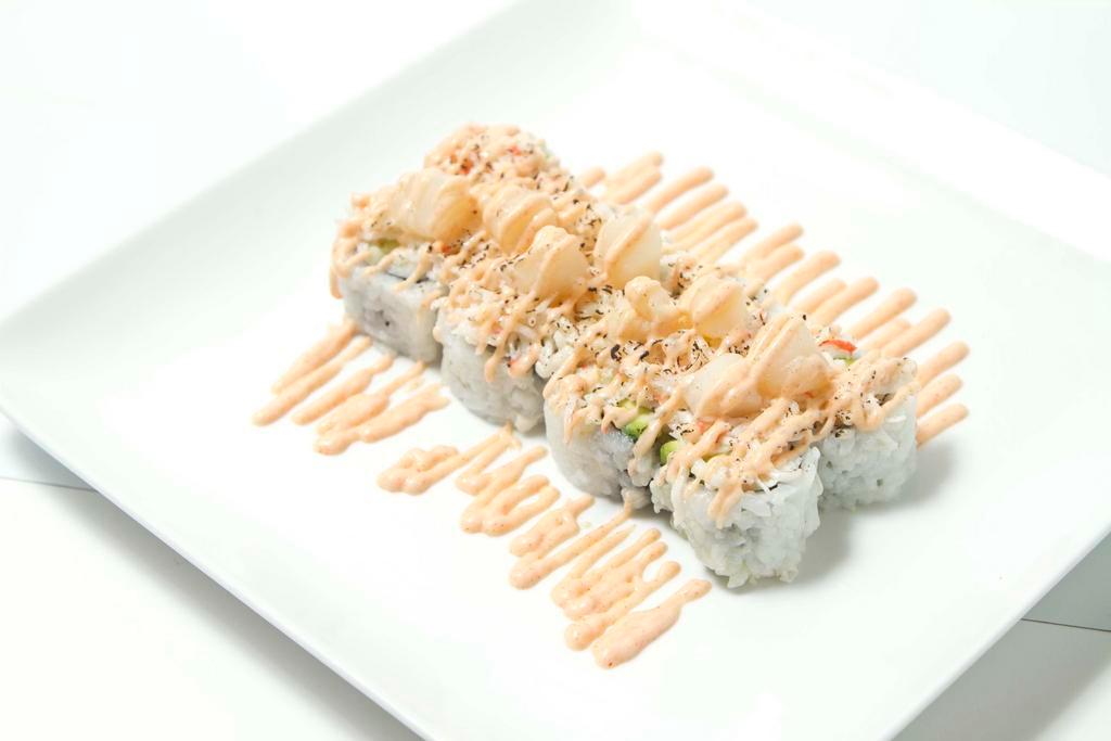 Baked Scallop Roll · California roll with baked scallop, crunch onion, masago, eel sauce, wasabi mayo, spicy mayo on top