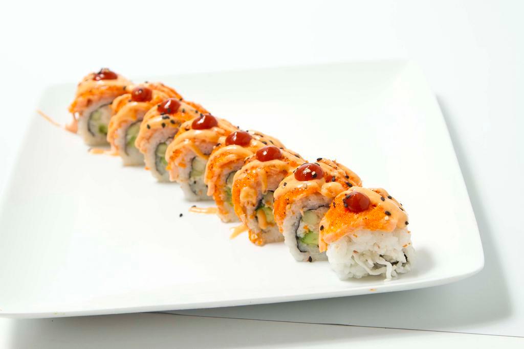Baked Salmon Roll · California roll topped with baked salmon and masago, spicy mayo, wasabi mayo, and chili sauce