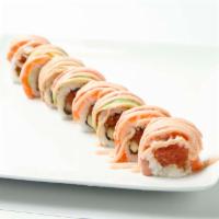 Kuso Roll · Spicy tuna and cucumber inside with salmon, avocado, and mango sauce on top