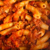 Meat Sauce  · Ground tomatoes, organic ground beef, parmesan cheese, pancetta, carrots, onion and garlic.
...