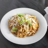 Pad Thai Dinner · Rice noodles with egg, bean sprouts, scallions, and crushed peanuts.