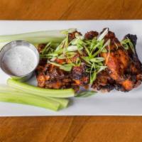 Wings · 1 lb. oven roasted and grilled wings, celery and ranch or blue cheese. Choose flavor: naked,...