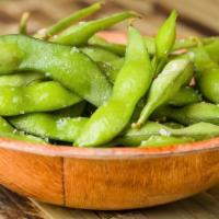 Steamed Edamame · Steamed lightly salted soy beans.