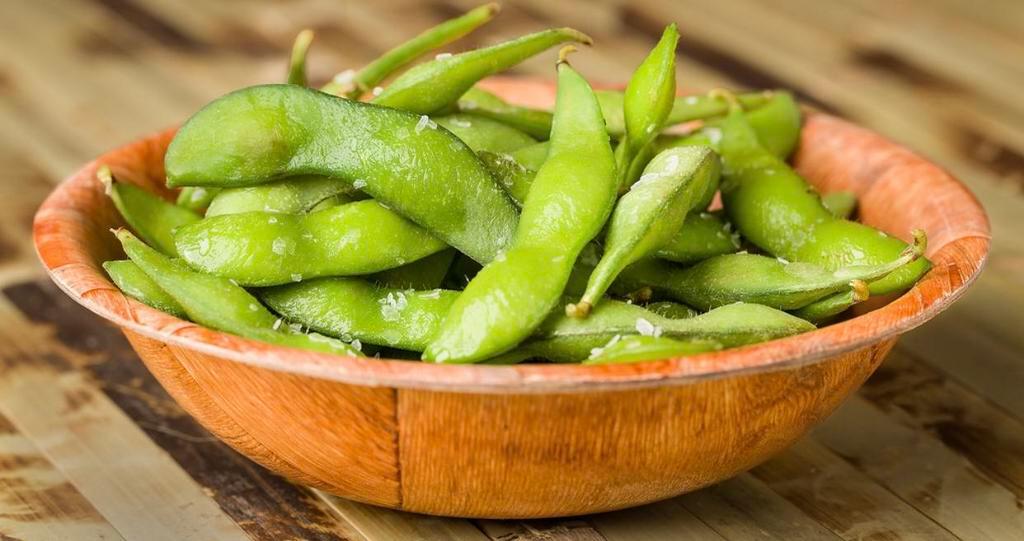 Steamed Edamame · Steamed lightly salted soy beans.