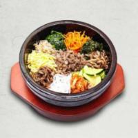 Spicy Pork Bowl · Traditionally prepared vegetables, spicy pork and eggs over rice.