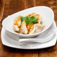 Famous Szechuan Chicken Dumpling · Steamed, with our famous Szechuan style spicy garlic vinaigrette soya sauce.