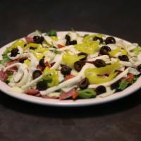 Anti Pasta Salad · Romaine lettuce topped with salami, pepperoni, capicola, ham, provolone, and mozzarella chee...