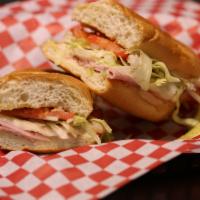 Ham and Cheese Sub · Ham and provolone cheese topped with lettuce, tomato, white onion, and choice of sauce it up...