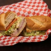 Club Sub · Ham, turkey, and provolone cheese topped with lettuce, tomato, white onion, bacon strips, an...