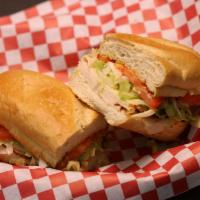 Turkey and Cheese Sub · Turkey and provolone cheese topped with lettuce, tomato, white onion, and choice of sauce it...