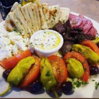 Greek Sampler Plate · Pita bread, salami, gyro meat, feta cheese, Kalamata olives, tomatoes and pepperoncinis serv...
