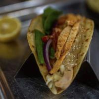 Jerk Taco · Grilled chicken, lettuce, tomato, onions, jerk aioli and cheese.