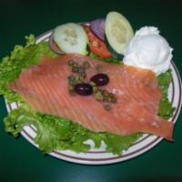 Sliced Lox Platter · Includes sliced tomato, cucumber, onion, olives, coleslaw, cream cheese and two bagels. Serv...