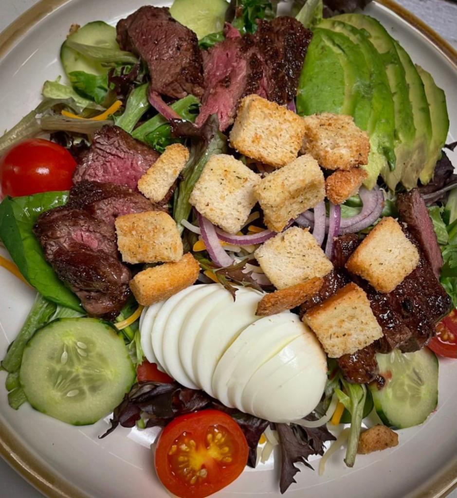 Tejas Grilled Salad · Spring mix, cherry tomatoes, red onion, cheese, egg, avocado, croutons with a choice of protein.