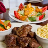 KC-Style Steak · Our KC Steaks -  Made Famous in West Texas...Made Legendary at Tejas Steakhouse and Saloon. ...