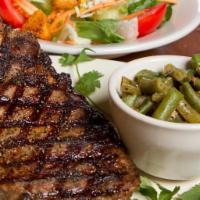 Ribeye · Hand-cut 12 oz. Ribeye.  Seasoned with our house seasoning. Served with your choice of 2 sid...