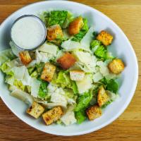 Caesar Salad · Romaine, garlic Parmesan croutons and shaved Parmesan with Caesar dressing.