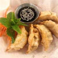 Gyoza Dumpling · 5 pieces. Ground chicken, cabbage, green onion, ginger wrapped with wheat flour Wrapper and ...