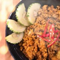 Southern Thai Dry Curry · Stir fried ground meat with southern style curry paste and generously with chili, garlic and...