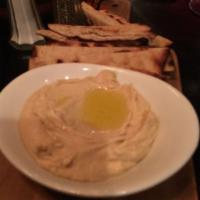 Hummus Spread · Served with naan bread. Gluten free.