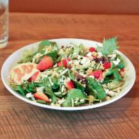 Strawberry Tamarind Salad · Spring mix topped with fresh strawberries, crisp apple slices, goat cheese and almonds all t...
