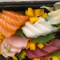 Sashimi Deluxe · 18 pieces. Assorted fresh fish with side order of sushi rice.