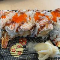 Dynamite Special Roll · Shrimp tempura cucumber inside topped with kani salad eel sauce crunch and masago