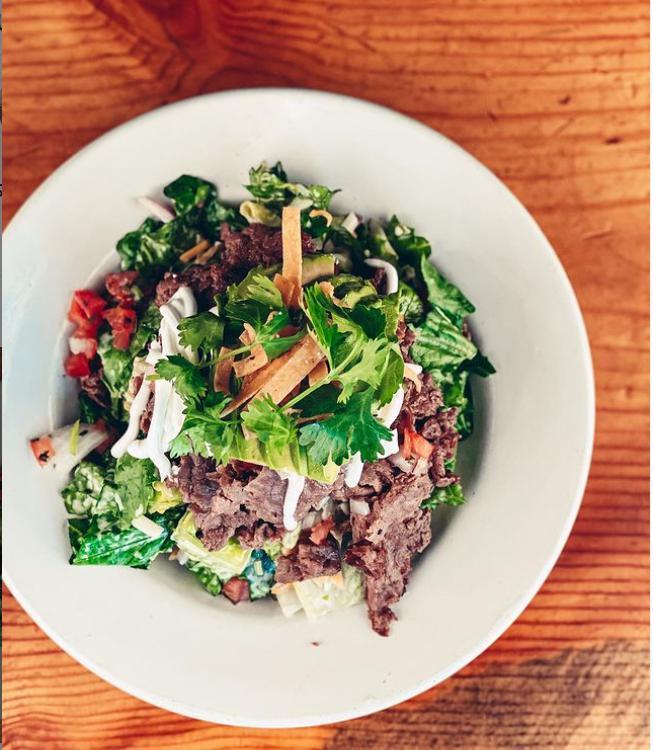 Steak Salad  · Marinated Skirt Steak, Avocado, Hearts of Romaine. Pico de Gallo, Tortilla Strips, Shredded Cheese, Sour Cream and  Jalapeno Ranch Dressing