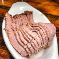 Slow Smoked Beef Brisket. · Beef brisket slow smoked for over 12 hours till it's tender and melts in your mouth.
