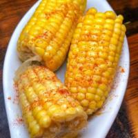 Corn on the Cob. · Freshly butter poached Corn on the Cob.