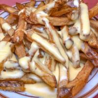 Cheese Fries.. · Our fresh cut fries smothered in our three cheese sauce.