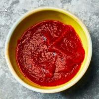 Side of Roundhouse Kick Chili Paste · (very spicy, gluten-free, vegetarian)