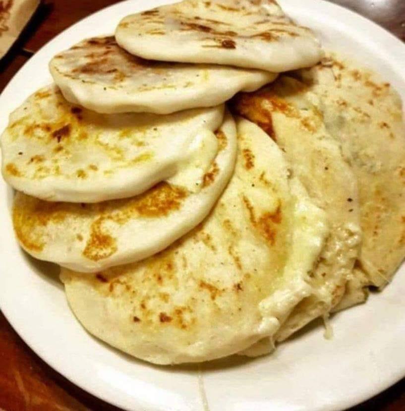 Frijol con Queso Pupusa · Cheese and beans. Corn or rice.