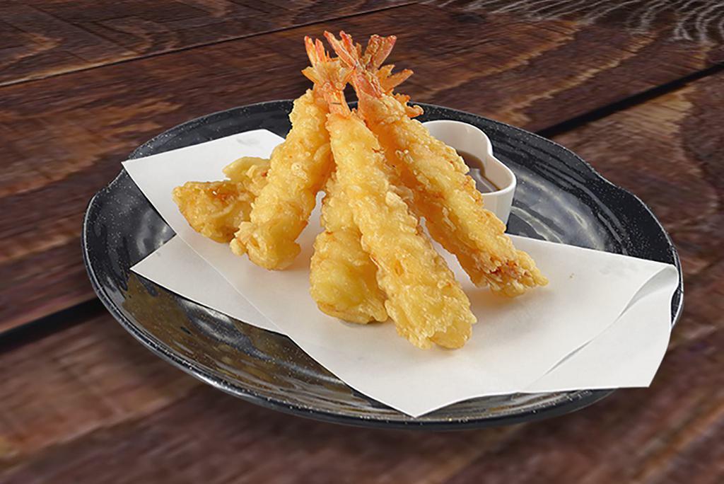 A9. SHRIMP TEMPURA (6 PIECES) (NEW ITEM) · Deep-fried shrimp coated with a light, crisp crust, and served sweet & sour sauce