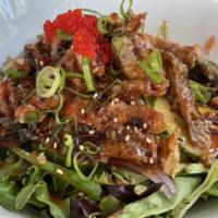 Thai Pork Salad · Grilled marinated pork with shallots, cilantro, scallions, and Bangkok style citrus dressing.